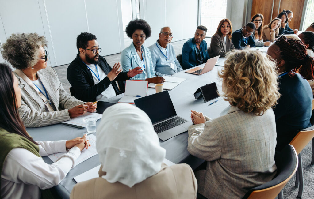 Professional coaching session with diverse team members