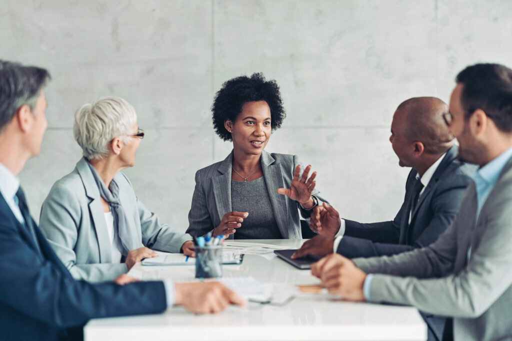 Mature black businesswoman talking on a meeting